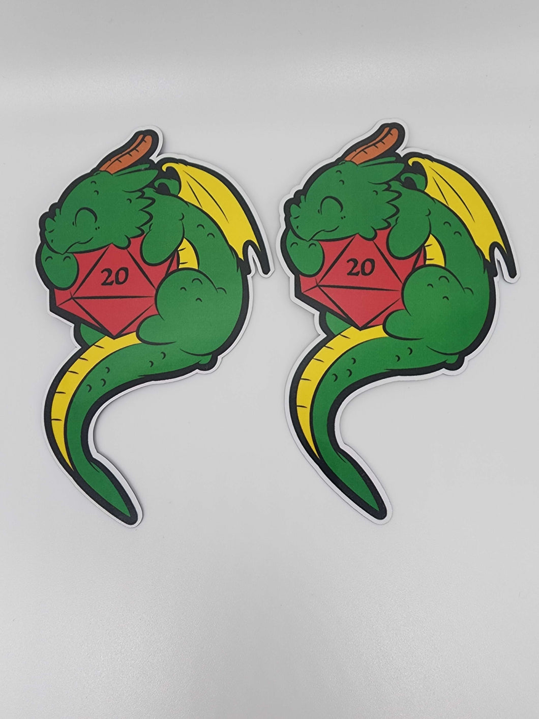 DND Dragons Holding Dice Sticker